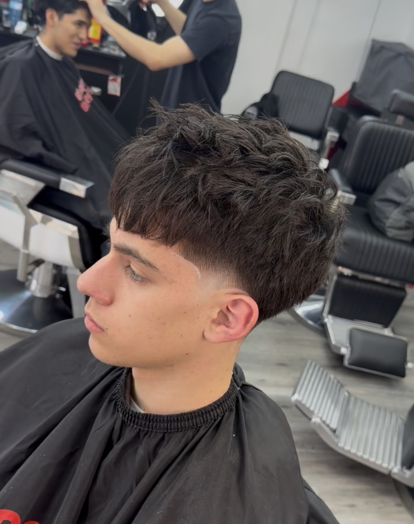 Textured haircut and fade by BKBlendz